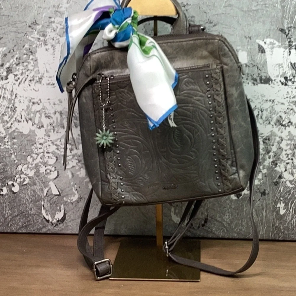 The Sak Leather Gray/ Green Embossed Leather Backpack